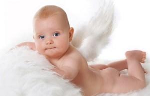 5 month old little baby wearing angel wings